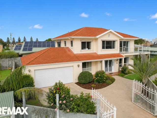Prestigious Home in Lakes Entrance with Water Views, Lift, Double Garage & A Few Steps to Shops and Cafés