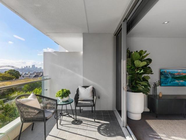Prestigious Ikon Address with Single Level Living & Bridge Views