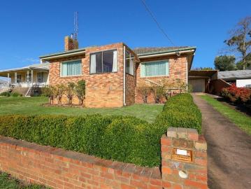 Prestigious Location Quality Brick Home