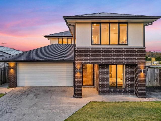 Prestigious Metricon Living in the Heart of Spring Mountain