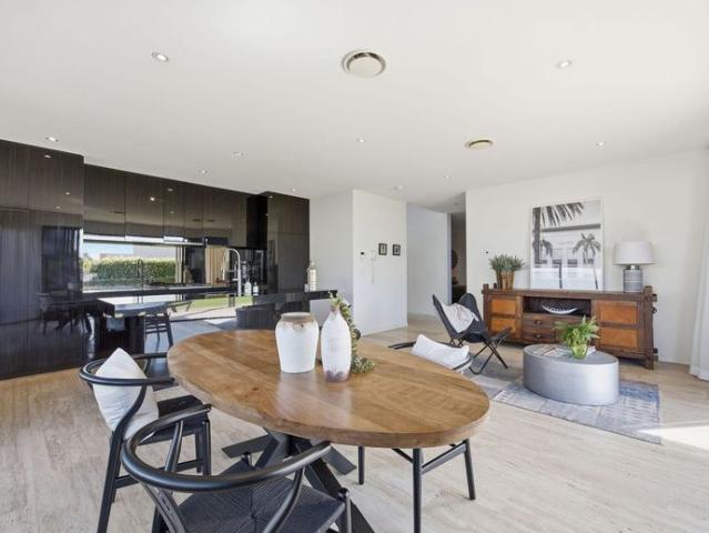 Prestigious North Facing Residence with Golf Course and Water Views Fully Furnished