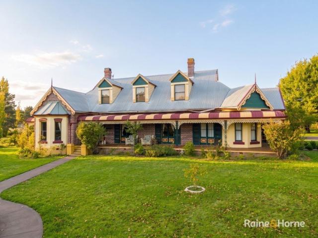 Prestigious South Hill Living on Beautiful Established Grounds