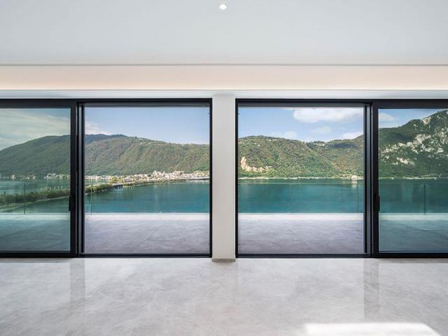 PRESTIGIOSO ATTICO DI DESIGN CON TERRAZZA VISTA LAGO | PRESTIGIOUS.