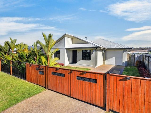 Privacy + poolside living = your Bushland Beach happy place