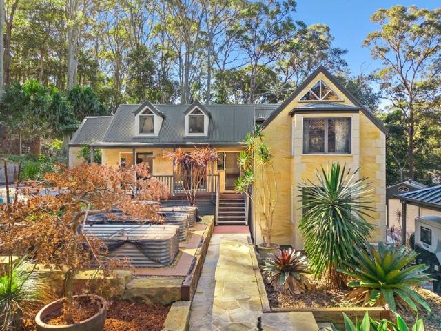Private Acreage Estate with Exceptional Space & Versatility