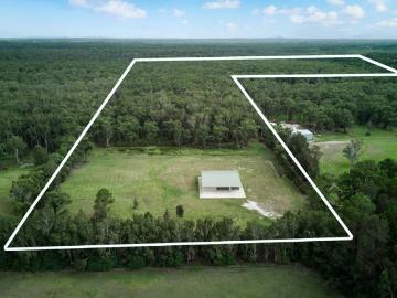 Private Acreage Escape with Quality Shed house