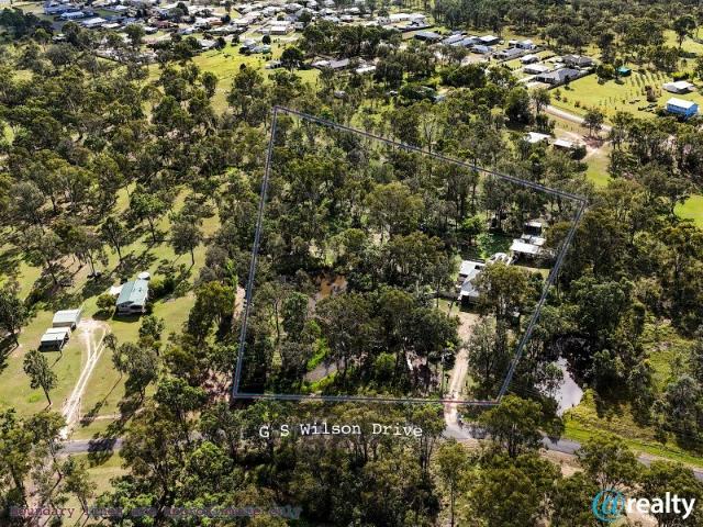 Private Acreage Living on 5 Acres Basically in Town!