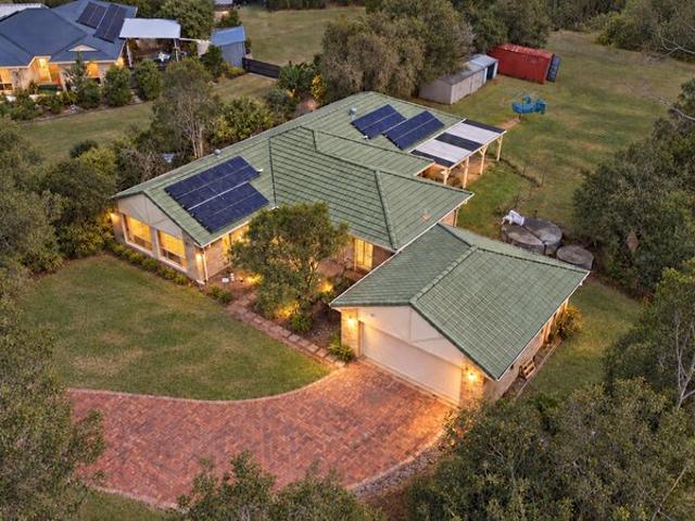 Private Acreage Living Backing onto a Peaceful Nature Reserve