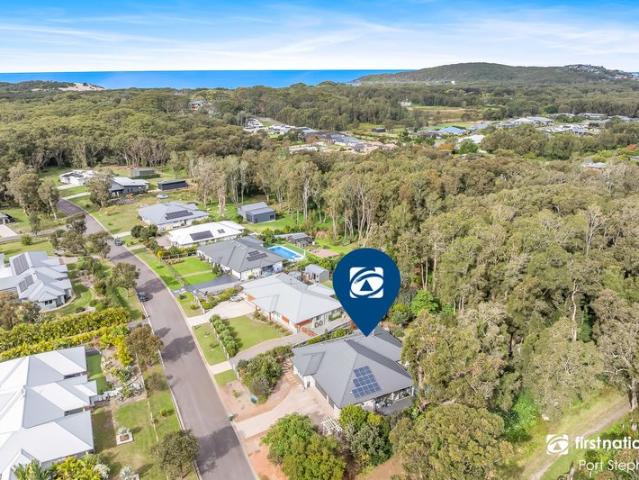 Private Acreage Living Just Moments from One Mile Beach