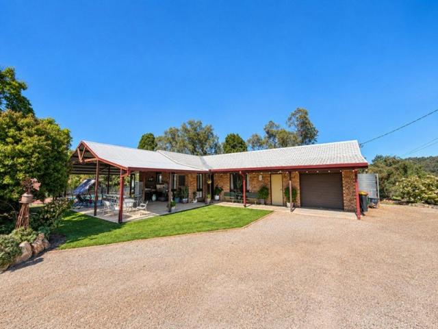PRIVATE ACREAGE LIVING WITHIN TOWN LIMITS