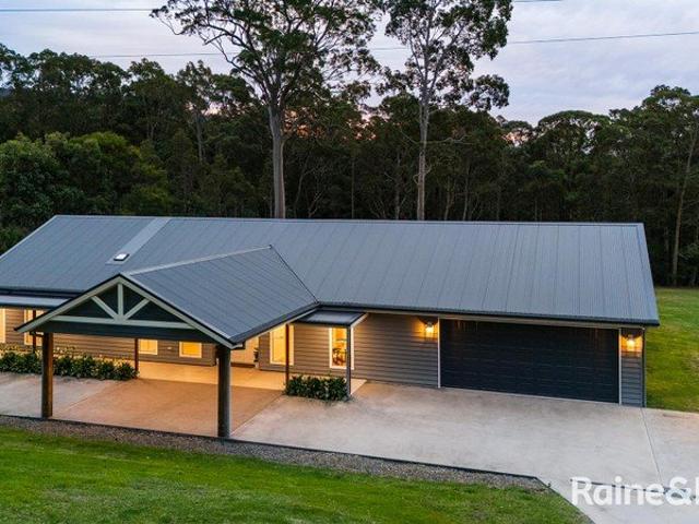 Private Acreage Living with Exceptional Versatility