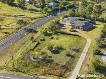 PRIVATE ACREAGE LIVING WITH INCREDIBLE SHEDDING & VIEWS