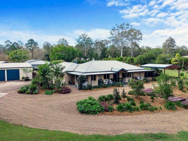 Private Acreage Living with Outstanding Multi Generational Appeal