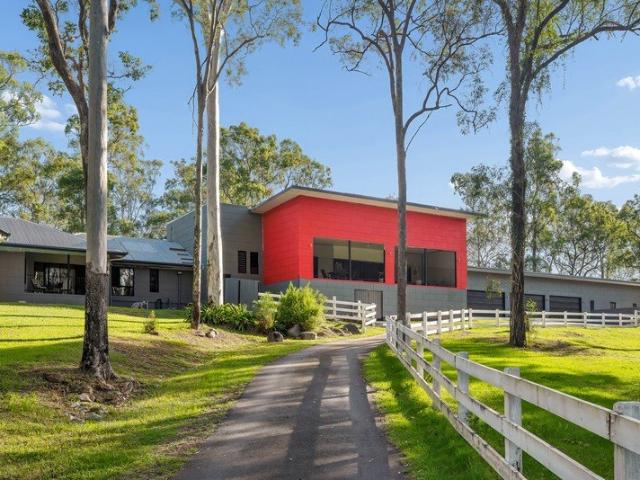 Private Acreage Living with Remarkable Scale & Versatility