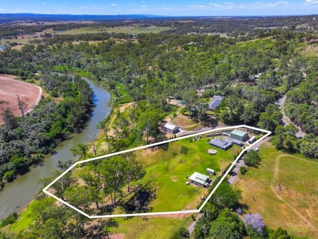 Private Acreage Living with Nepean River Frontage & Multiple Sheds