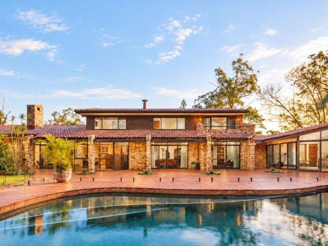 Private Acreage Sanctuary Designed for Living, Leisure and Entertaining