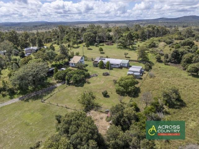 Private Acreage Retreat with Dual Living on 8.38 Acres