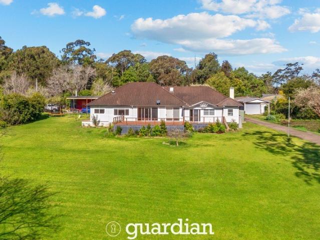 Private Acreage Retreat with Dual Living
