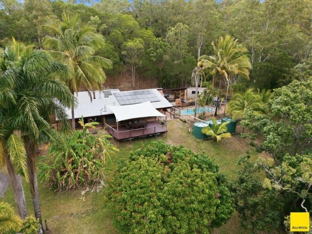 Private Acreage Retreat with Exceptional Space & Character
