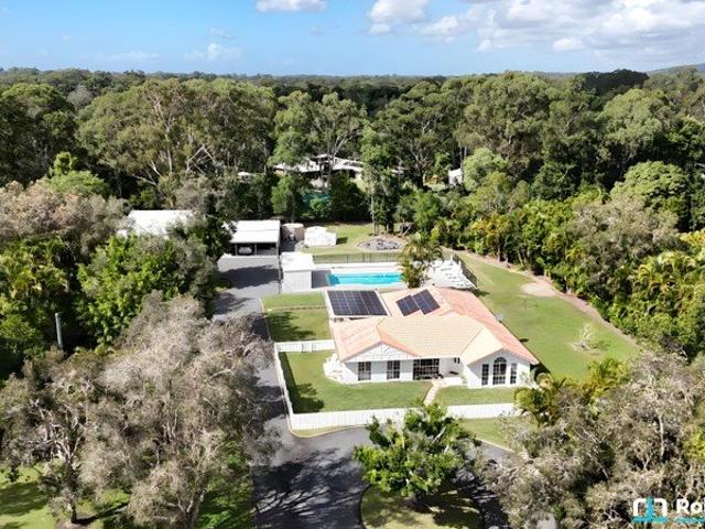 Private Acreage Retreat with Resort Style Living & Exceptional Shed Space