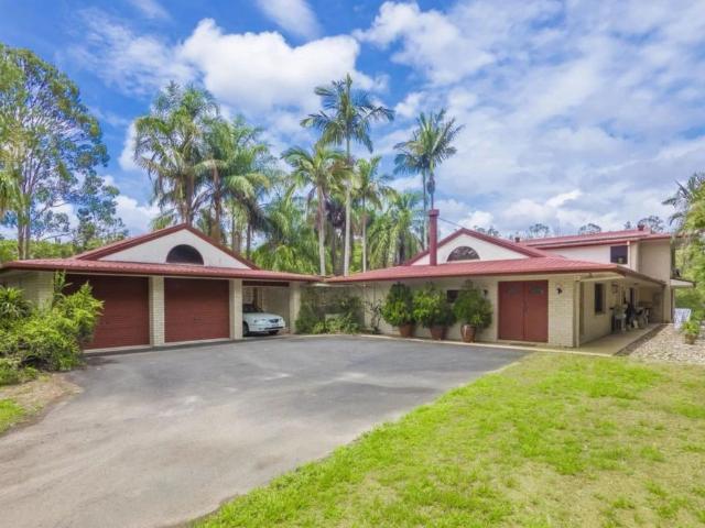 Private Acreage Retreat with Resort Style Living – Stunning 4 Bedroom Home with Pool & Gardens *short term lease only