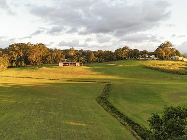 Private Acreage Retreat with Shed, Creek Frontage & Town Water