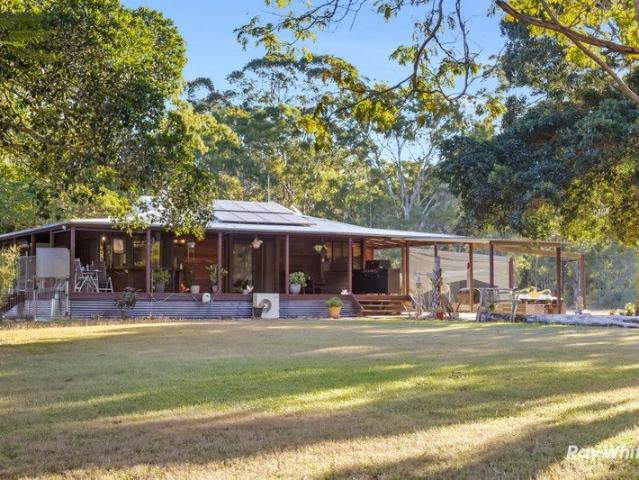 Private Acreage Retreat Over 8.5 Acres of Country Living Just Minutes from the Coast