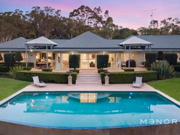 Private Acreage with Luxurious Family Living
