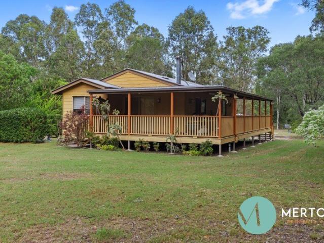 Private Acreage with Rainforest, Bore & Wraparound Queenslander Charm