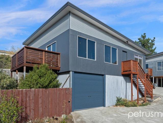 Private And Low Maintenance Living!