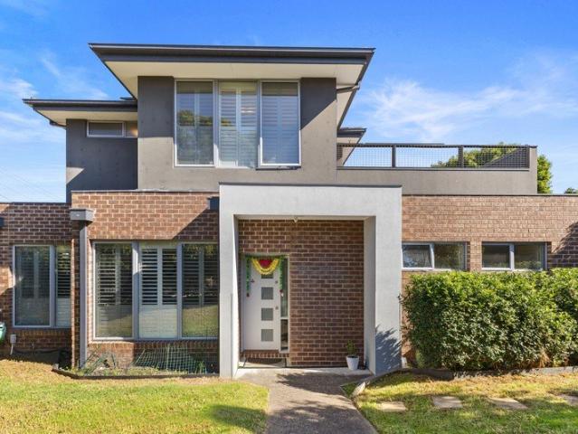 Private and Modern Two Level Living with IndoorOutdoor Appeal