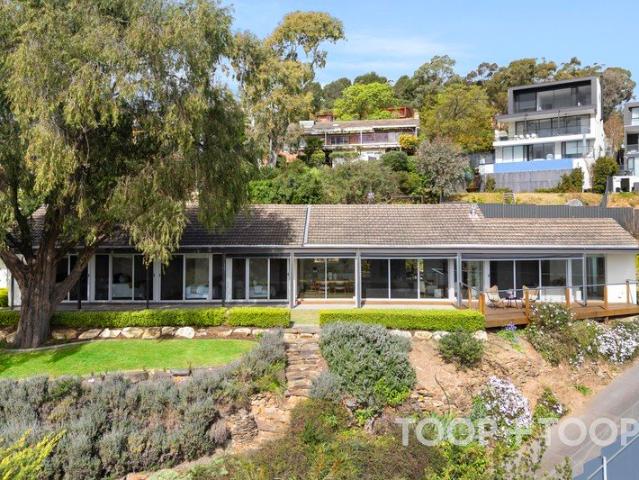 PRIVATE AND PEACEFUL EASTERN FOOTHILLS OASIS WITH SPECTACULAR VIEWS ACROSS ADELAIDE