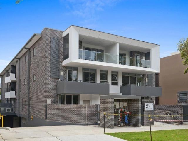 Private and Sun Drenched Apartment in Sought After Boutique Complex