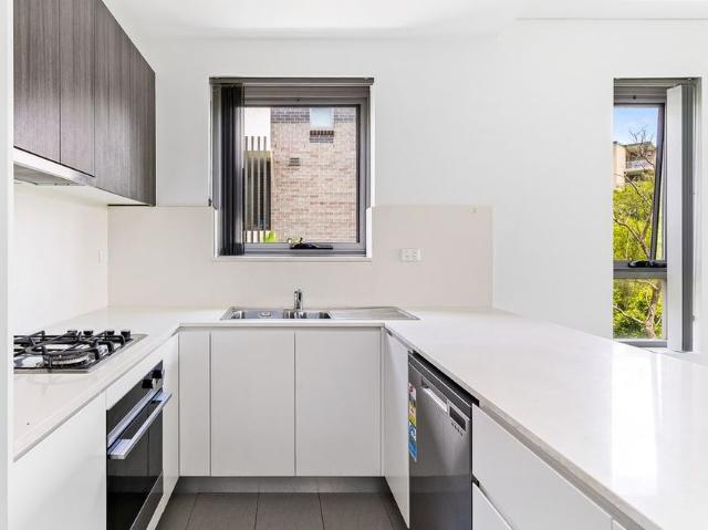 Private and Sun Drenched Apartment in Sought After Boutique Complex