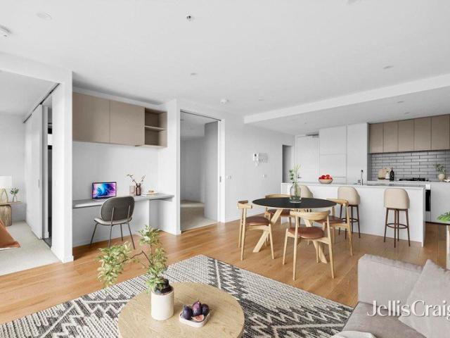 Private balcony, bay views and a prime Geelong position