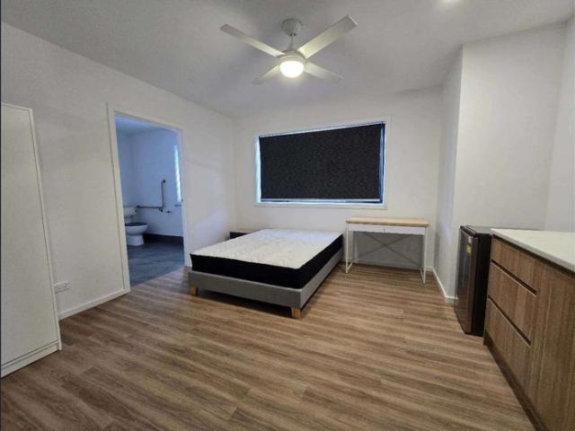 Private bathroom + Kitchenette