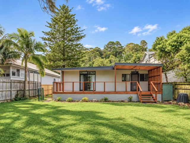 private beach pad with enormous level back yard
