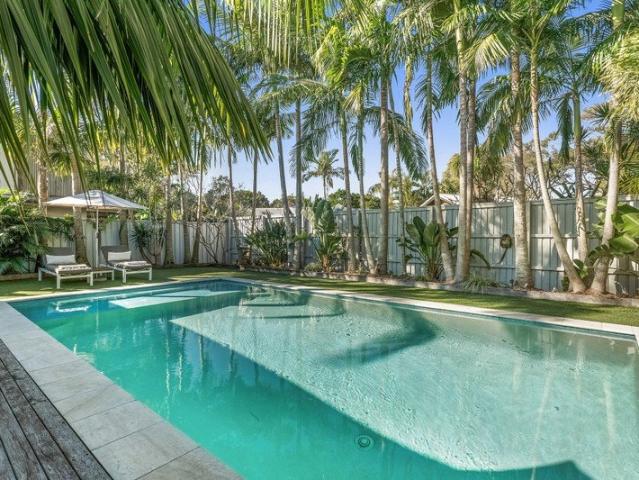 Private Beachside Luxury with Resort Style Living in an Exclusive Coastal Enclave