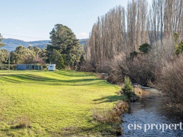 Private Creekside Sanctuary with Endless Lifestyle Appeal