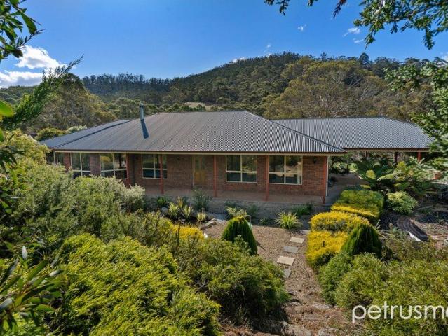 Private, expansive family living on a generous acreage