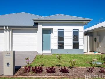 Private, Easy Care Duplex Living Just Minutes from Beaches, Shops and Golf Course