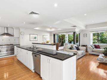PRIVATE. ELEGANT. FUTURE PROOF LIVING WITH CITY VIEWS