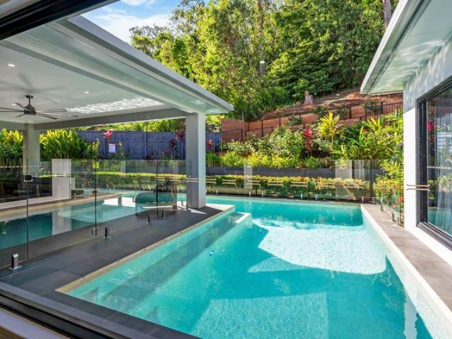 Private, Elevated Near New Home with Spectacular Mountain Views and Lap Pool