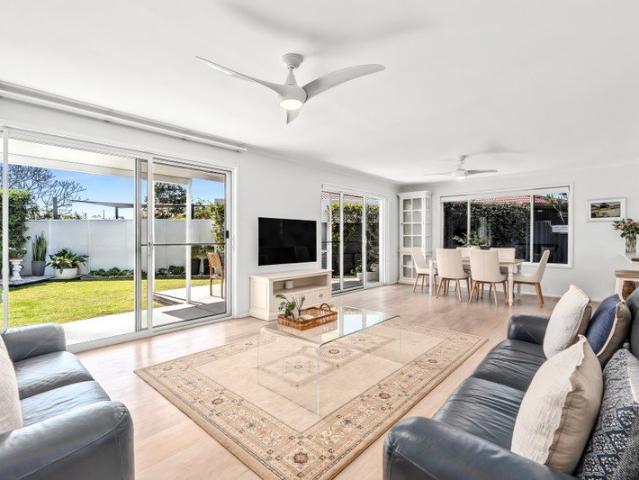 Private, fully renovated single level duplex with Exclusive use North facing yard