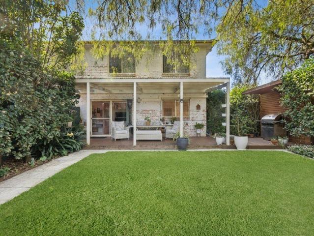 Private family townhouse amidst lush mature gardens