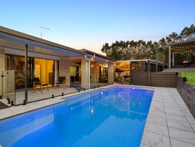 PRIVATE FAMILY RETREAT WITH HEATED POOL & EXCEPTIONAL OUTDOOR LIVING