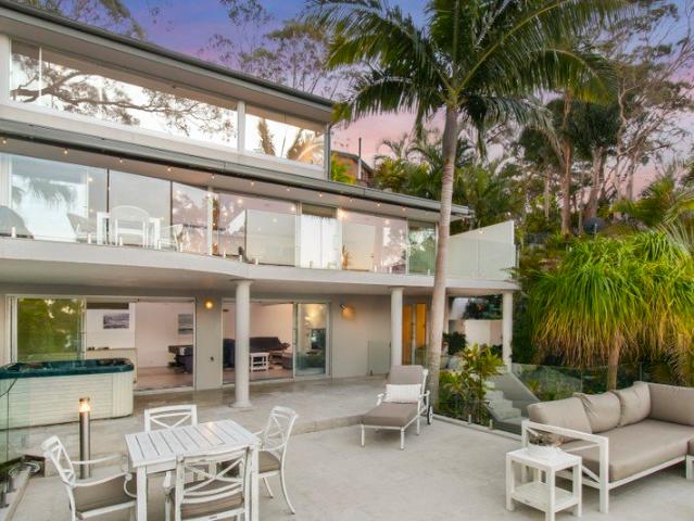 Private hillside sanctuary with leafy ocean panoramas