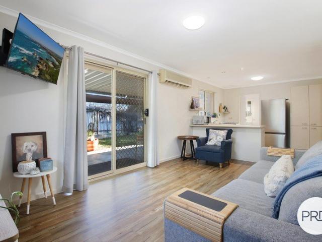 PRIVATE LIVING WITH A SURPRISINGLY SPACIOUS BACKYARD