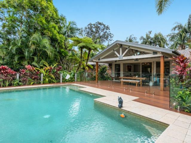 Private low maintenance acreage living + resort style pool
