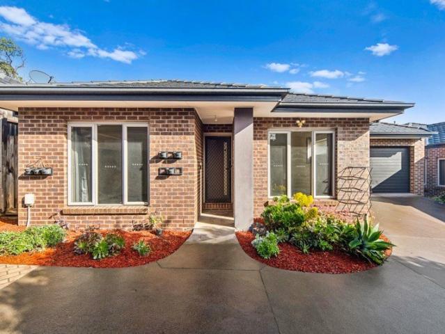 Private Low Maintenance Living in a Boutique Complex of Four